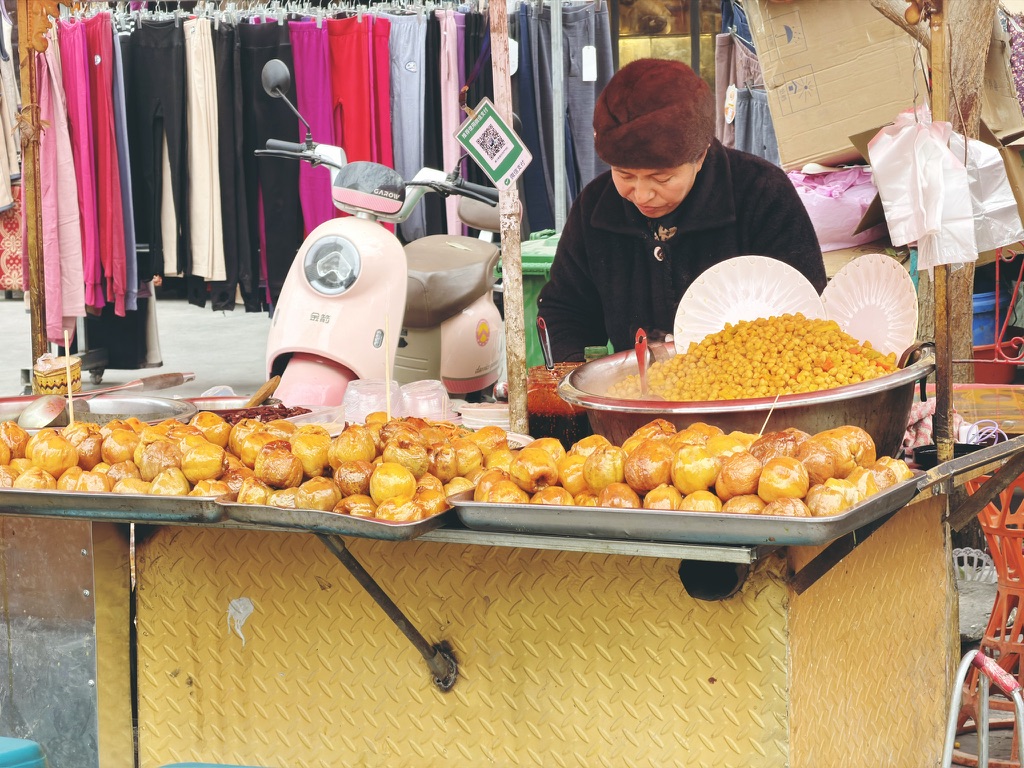 结果还有两个都卖的小摊儿